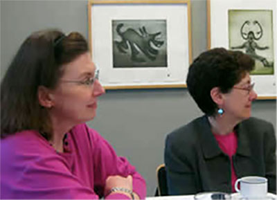 At the Spring 2009 quarter lunch Asst. Director Elzbieta Foeller-Pituch and archival librarian Janet Olson listen with interest to Leopold Fellows talking about their research