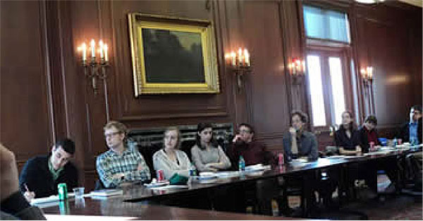 Leopold Fellows and faculty sponsors at the Fall Quarter 2011 lunch listening to three Fellows present their research